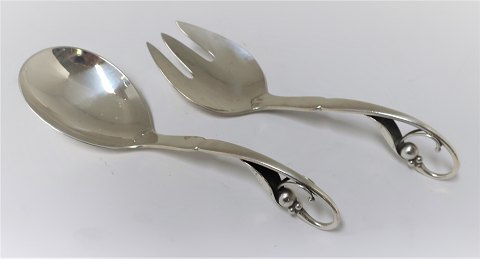 Georg Jensen. Silver cutlery. Sterling (925). Serving Spoon & Fork. Design no. 
21. Length 16.5 cm. Produced 1945-51