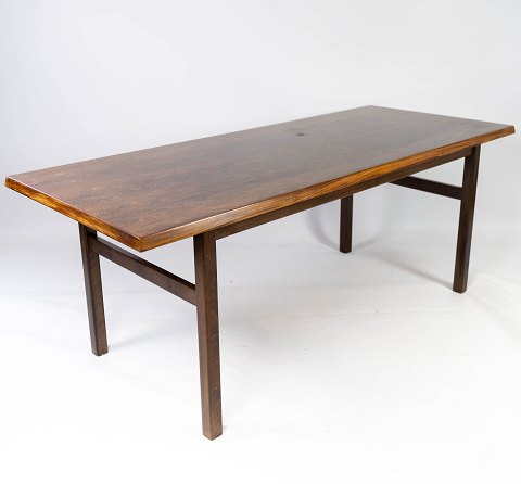 Coffee table in rosewood of danish design from the 1960s. 
5000m2 showroom.