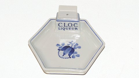 Aluminia Tranquebar, C.L.O.C. Liqueur holder til en tændstikæske.
Dekorationsnummer #3079/#269.