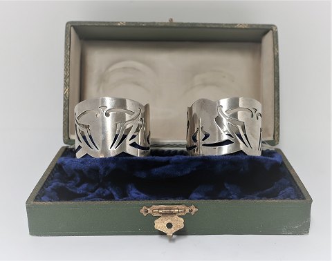 Ein Paar Deutsche Serviettenbänder aus Silber (800) in einer Box.