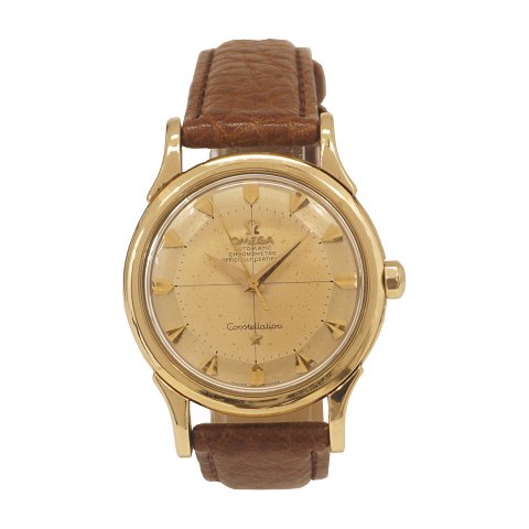 Omega Constellation 14kt guld med pie pan skive. 
Model 2852/2853 SC. Kaliber 501, automatik. 
Fremstillet ca. år 1956. D: 35mm