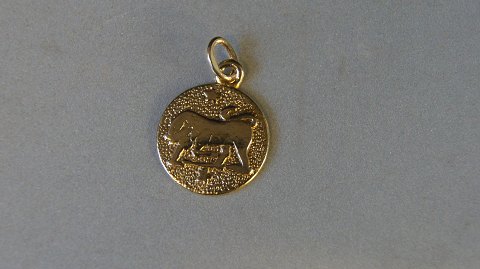 Elegant pendant 
Taurus zodiac sign 
14 carat Gold