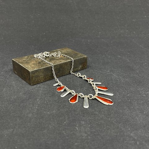 Fine necklace with red enamel