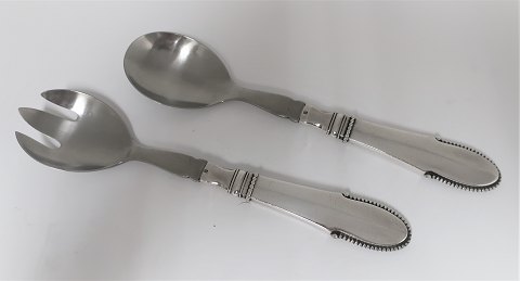 Georg Jensen. Silver cutlery (925). Beaded. Salad set with steel. Length 22.5 
cm. Produced 1933-1945.