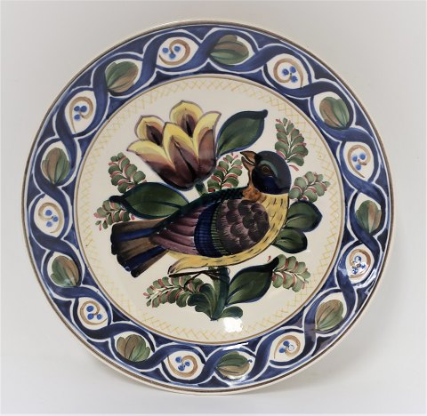 Aluminum. Faience Plate with bird. Model 1170-404. Diameter 20 cm.