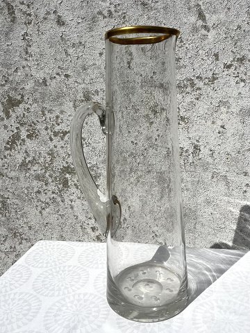 Large glass jug with gold rim
*DKK 350