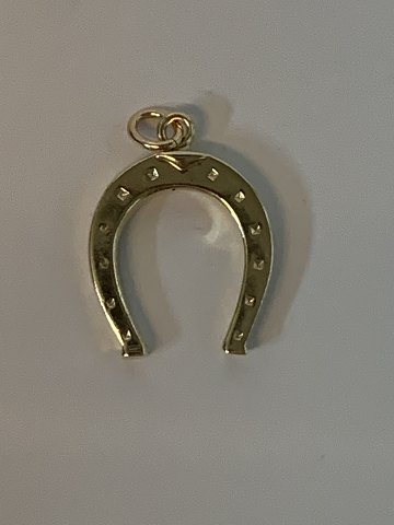 Horse shoe in 14 karat gold
Stamped 585
Height 26.74 mm