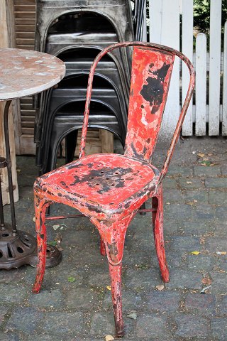 Rare Original, old French Tolix design chair in metal with red original color 
with a super fine patina....