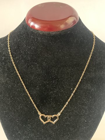 Necklace with Double Heart Pendant in 8 carat Gold
