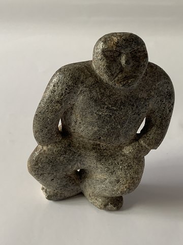 Soapstone figure shaped like a man, Greenlandic stone art.