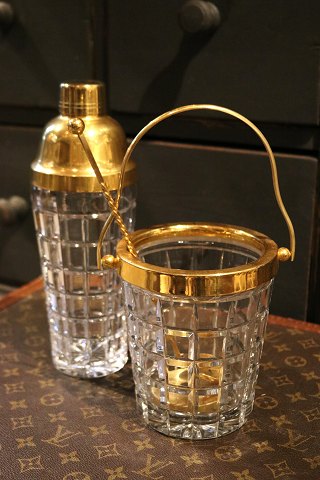 Delicious bar set , cocktail shaker and ice bucket 
from the 70s in crystal glass with brass...