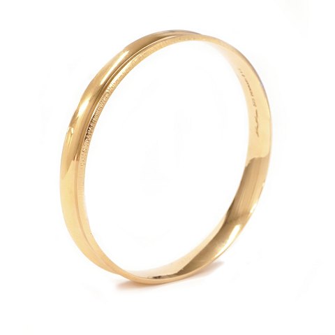 Hans Hansen armring i 14kt guld dessin nr 212. 
Stemplet Hans Hansen. D ind: 6,4cm