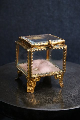 Antique French jewelery box in bronze and faceted glass and silk cushion at the 
bottom...