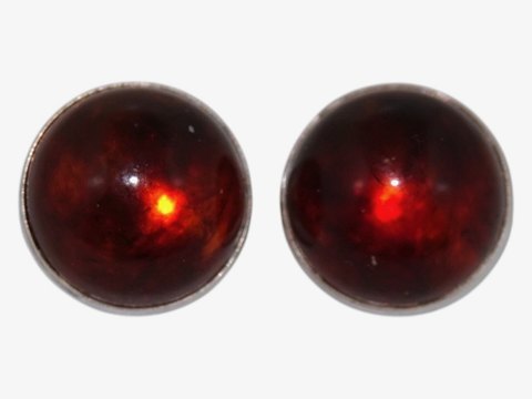 N.E. From Sterling silver
Modern earclips with amber from 1950-1960