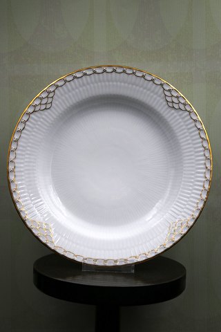 Rare Royal Copenhagen deep plate in Princess with gold decorations. 
from 1893-1900...