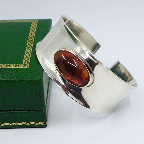 N. E. From; Bangle of sterling silver with amber