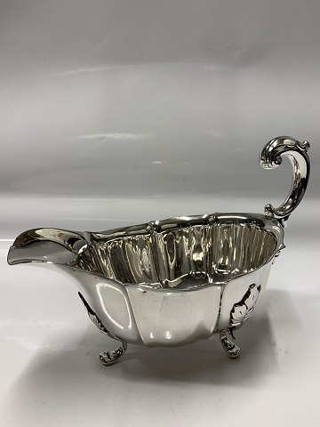 Silver sauce bowl on three feet .Carl M. Cohr.Length 20.5 cm.