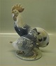 Royal Copenhagen figurine 
1094 RC Cock and hen Chr. Thomsen 1903 21 x 18 cm