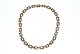 Antik Huset 
presents: 
Block 
necklace, 8 
Carat Gold