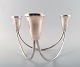 Duchin sterling, Usa, three-armed candlestick in modern design.
