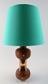 Danish design table lamp oak with brass details.
