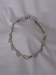 N. E. From
Necklace