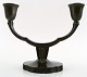 Just Andersen candlestick in patinated metal.

