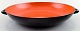 Orange Krenit dish by Herbert Krenchel. 
