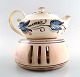 Kähler, Denmark, glazed stoneware teapot with heater for tea lights.
