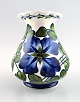 Aluminia/Royal Copenhagen faience vase, hand painted with floral motifs.