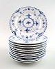 Royal Copenhagen. Royal porcelain Blue Fluted half lace, 3 plates.
No. 1/574.