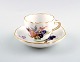 Meissen demitasse / small coffee cup decorated with flowers and fruits.