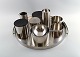 Arne Jacobsen for Stelton, tray, pitcher, ashtray and more, stainless steel.