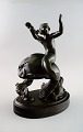 Just Andersen (1884-1943). Figure in light bronze in the form of a seaboy on 
fish.