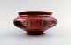 Kähler, Denmark, glazed stoneware vase in red luster glaze.
