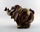 Royal Copenhagen large stoneware figure of happy baby elephant.
Designed by Knud Kyhn.
Decoration number 20138.