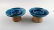 Kähler, Denmark, glazed stoneware, a pair of low candlesticks, 1960s.
Designed by Nils Kähler. Turquoise glaze.