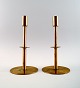 Hans Agne Jakobsson, Markaryd, Sweden, a pair of candlesticks in brass.