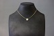 Georg Jensen DAISY pendant with chain in gilded 925 sterling silver.
5000m2 showroom.