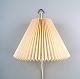 Le Klint wall lamp with pleated screen.
