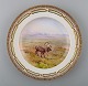 Royal Copenhagen Flora Danica / fauna Danica dinner plate with  motive of 
reindeer in landscape.