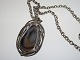 Anette Bord
Large pendant with stone in long chain from 
1970-1980