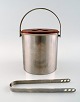 Arne Jacobsen for Stelton ice bucket with tongs in stainless steel.
