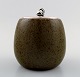Erik Rahr for Saxbo, ceramic pot with lid in silver, decorated with beautiful 
glaze in shades of brown.