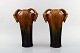 Michael Andersen. A pair of vases in ceramics with Rams. Luster glaze.
Stamped indistinctly. Early model.