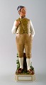 Carl Martin-Hansen: Porcelain figure of male in national dress. 
Royal Copenhagen, Queen Juliana Maria mark. 
Number 12229.