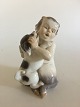 Royal Copenhagen Figurine af Faun med Hundehvalp No. 2590