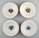 4 antique Royal Copenhagen deep plates in flora danica style.
