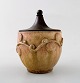 Arne Bang (1901-1983). Jar with lid of glazed stoneware with foliage in relief, 
lid of patinated bronze.