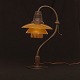 Poul Henningsen, 1894-1967, for Louis Poulsen: Table lamp "Question Mark", PH 
2/2. Burnished brass. original glass.
H: 39,5cm